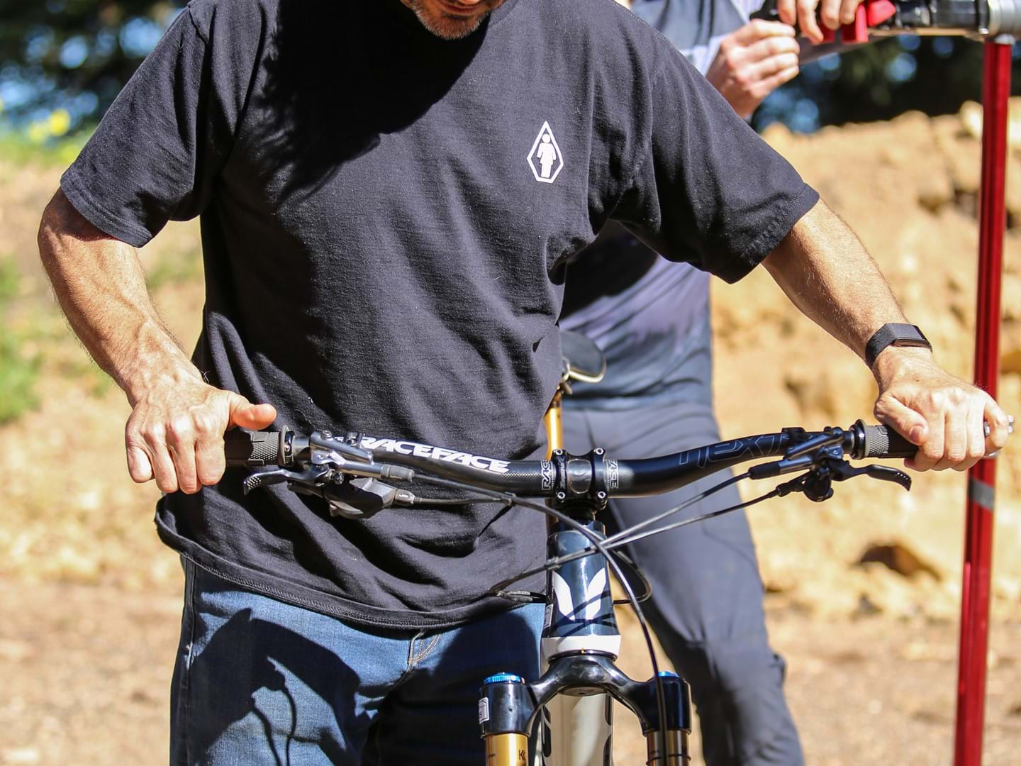 Mechanic checking the front suspension of a Devinci Spartan High Pivot SHP  